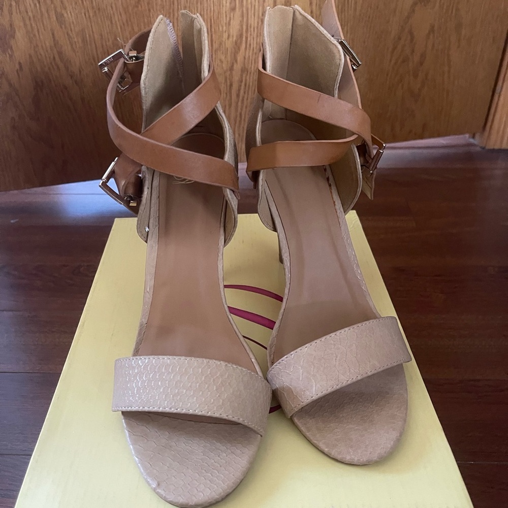 Tan colored open toe heel